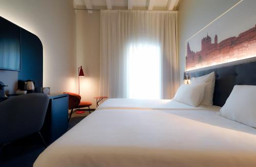 Habitación Doble Privilege del hotel Mercure Bergamo Centro Palazzo Dolci. Foto 3
