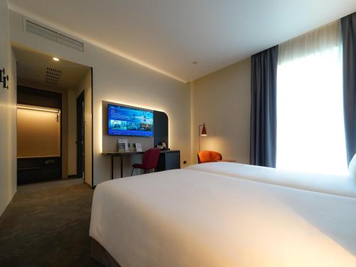 Habitación Doble Estándar - 2 camas del hotel Mercure Bergamo Centro Palazzo Dolci. Foto 3