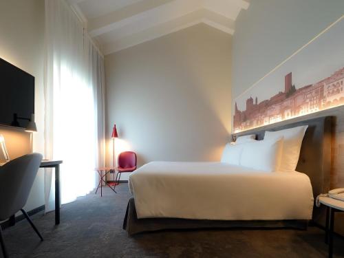 Habitación Doble Privilege del hotel Mercure Bergamo Centro Palazzo Dolci. Foto 3