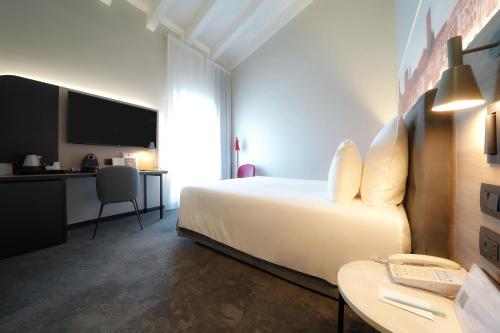 Habitación Doble Privilege del hotel Mercure Bergamo Centro Palazzo Dolci. Foto 9