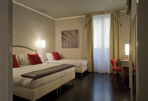 Habitación Triple del hotel Rosso23. Foto 2