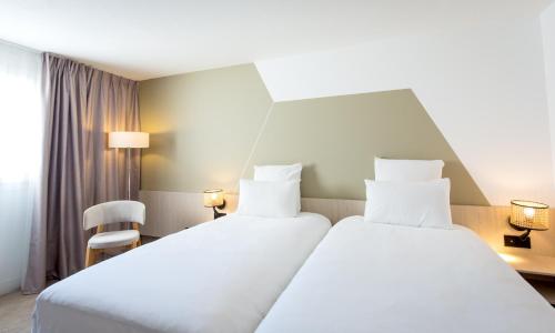 Habitación Doble Clásica - 2 camas del hotel Mercure Cannes Mandelieu. Foto 3
