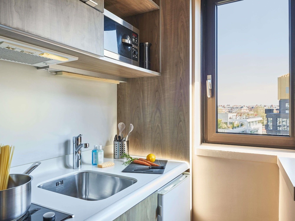 Apartamento con camas individuales del hotel Apparthotel Mercure Paris Boulogne. Foto 1