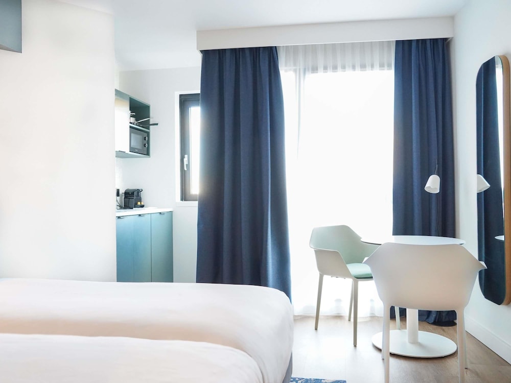Apartamento con camas individuales del hotel Apparthotel Mercure Paris Boulogne. Foto 3