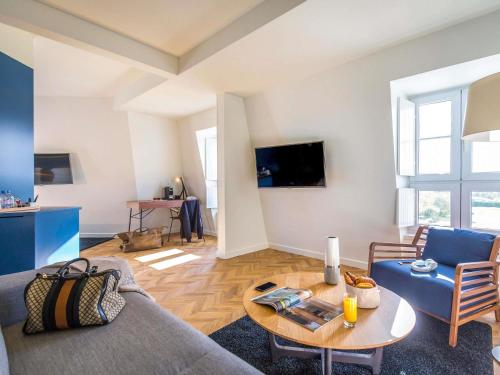 Suite del hotel Mercure Chantilly Resort and Conventions. Foto 1