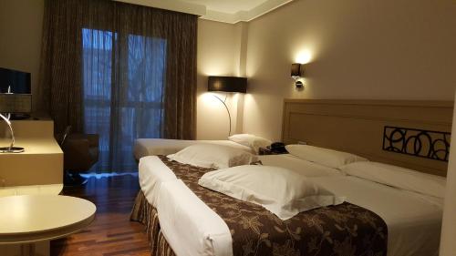 Habitación Triple del hotel Cumbria Spa and. Foto 3