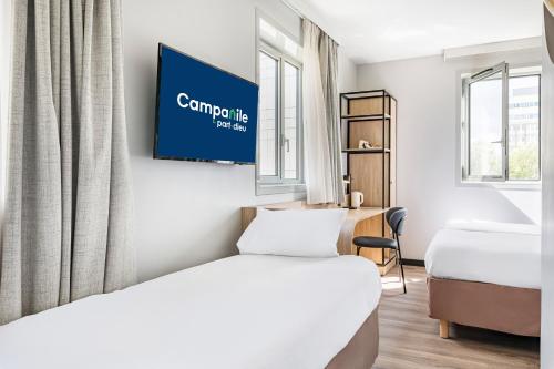 Habitación Triple con 3 camas individuales del hotel Campanile Lyon Centre - Gare Part Dieu. Foto 3