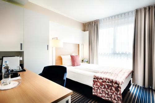 Habitación Individual Superior del hotel Best Western Plus Welcome Frankfurt. Foto 4