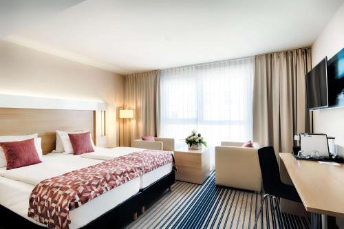 Habitación Doble Deluxe - 2 camas del hotel Best Western Plus Welcome Frankfurt. Foto 1