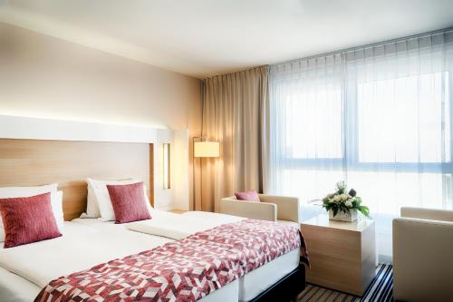 Habitación Doble Deluxe - 2 camas del hotel Best Western Plus Welcome Frankfurt. Foto 5