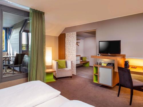 Habitación Premium con cama extragrande del hotel Mövenpick München Airport