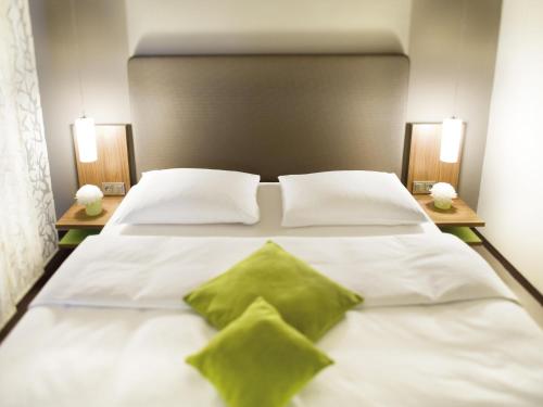 Habitación Premium con cama extragrande del hotel Mövenpick München Airport. Foto 2