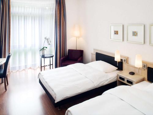 Habitación Doble Superior - 2 camas del hotel Mövenpick München Airport. Foto 5