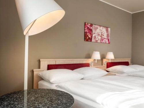 Habitación Doble Clásica - 2 camas del hotel Mövenpick München Airport. Foto 5