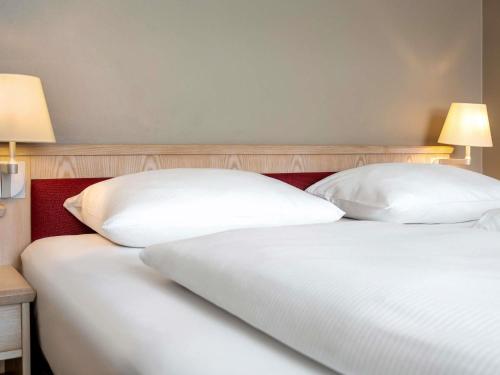 Habitación Clásica con cama extragrande del hotel Mövenpick München Airport
