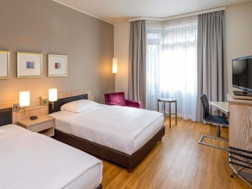 Habitaciones Comunicadas Familiares del hotel Mövenpick München Airport. Foto 1