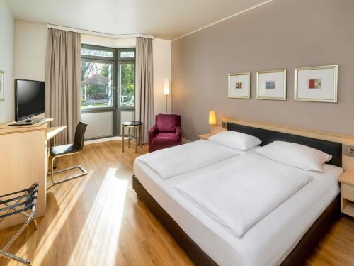 Habitaciones Comunicadas Familiares del hotel Mövenpick München Airport. Foto 3