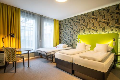 Habitación Triple del hotel Thon Eu. Foto 4