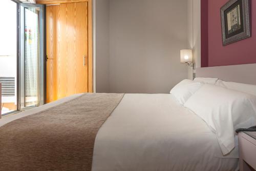 Habitación Doble Pequeña del hotel Aacr Museo. Foto 4