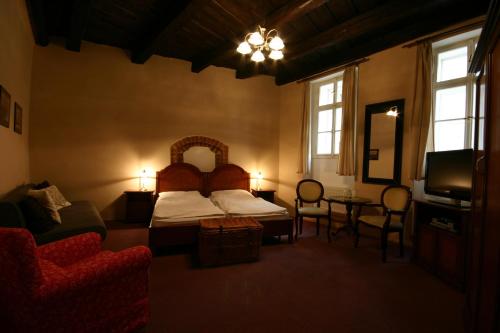 Habitación Doble Superior con cama supletoria del hotel and Residence U Tri Bubnu. Foto 5