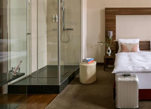 Habitación Superior Plus con cama extragrande y vistas a la ciudad del hotel Flemings Selection Wien-City. Foto 2