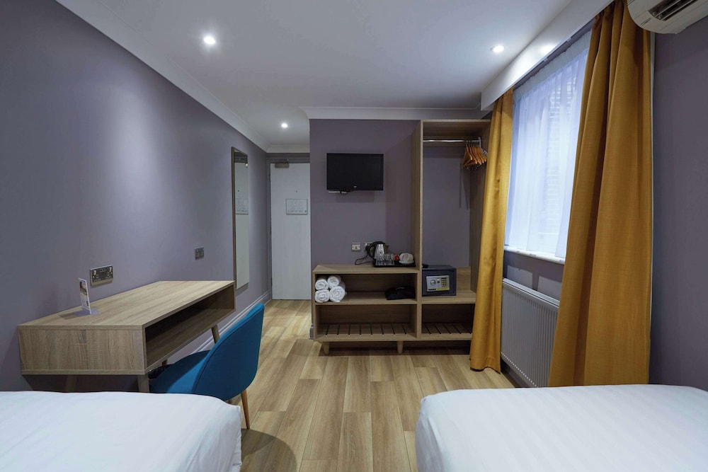 Habitación estándar con 2 camas individuales del hotel Comfort Inn Victoria. Foto 3