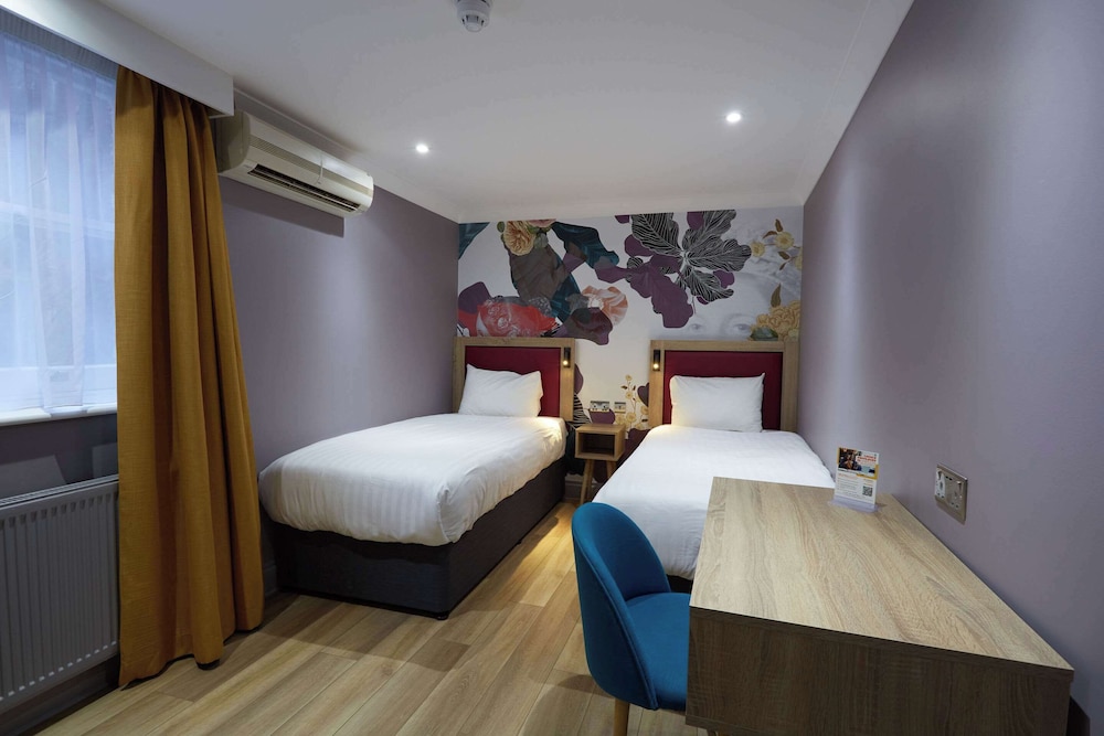 Habitación estándar con 2 camas individuales del hotel Comfort Inn Victoria. Foto 4