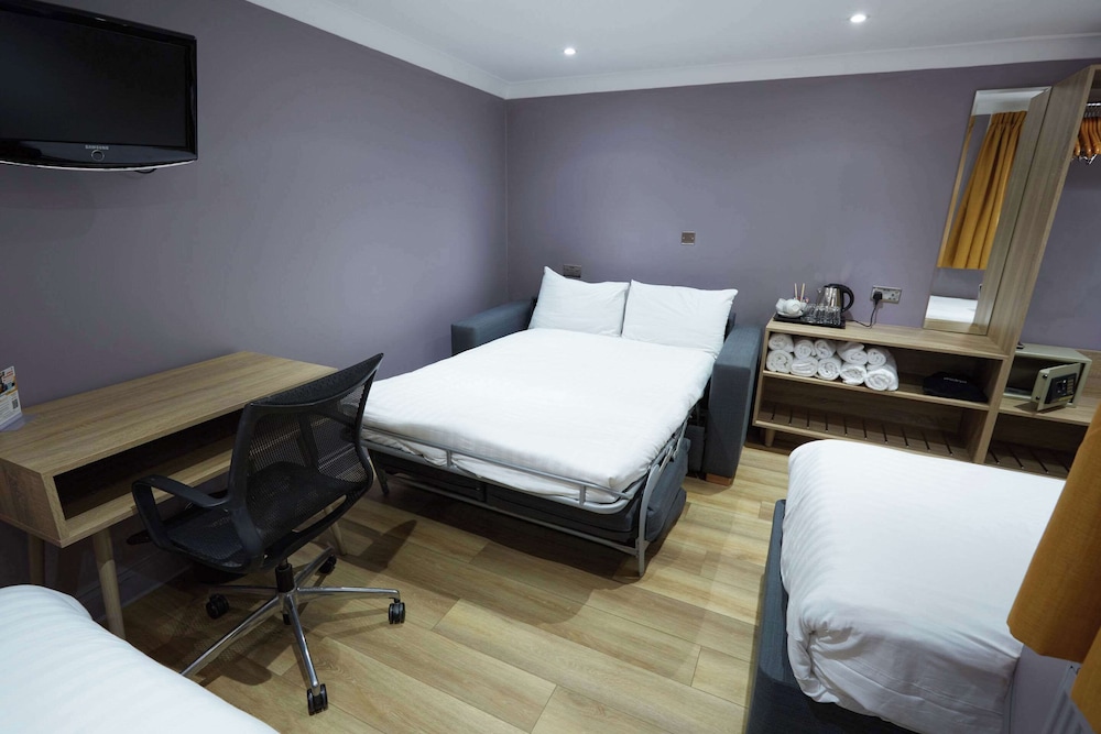 Habitación familiar, 2 camas dobles, no fumadores del hotel Comfort Inn Victoria. Foto 3