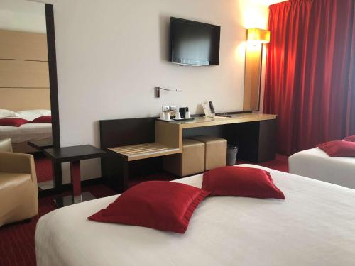 Habitación Cuádruple Confort - 2 camas grandes del hotel Best Western Plus Galileo Padova. Foto 7