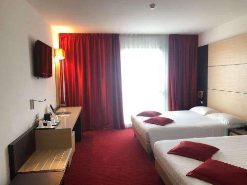 Habitación Cuádruple Confort - 2 camas grandes del hotel Best Western Plus Galileo Padova. Foto 13