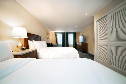 Suite Junior con 2 camas dobles del hotel Stanford. Foto 3
