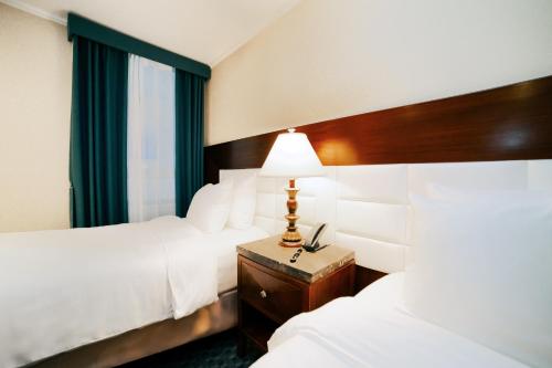 Habitación Doble Estándar - 2 camas del hotel Stanford. Foto 1