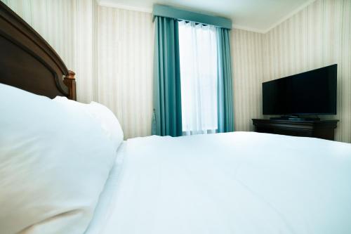 Habitación Doble Deluxe del hotel Stanford. Foto 2