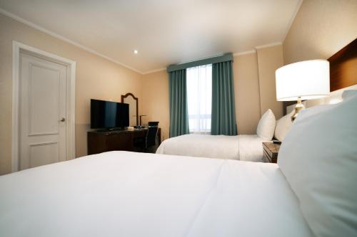 Habitación Doble Deluxe - 2 camas del hotel Stanford