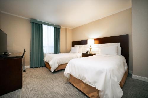 Habitación Doble Deluxe - 2 camas del hotel Stanford. Foto 1