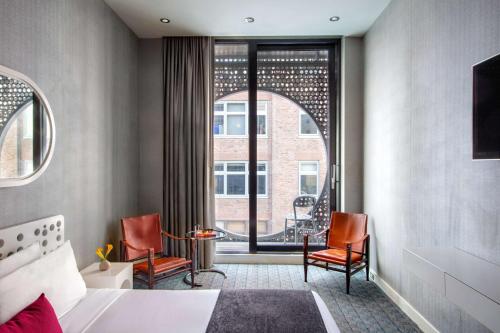 Habitación Bronze con balcón - 1 cama extragrande del hotel Dream Downtown