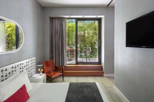 Suite Platinum con acceso a la piscina - 1 cama extragrande del hotel Dream Downtown. Foto 3