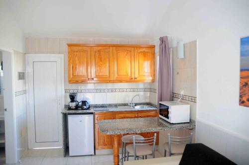 Bungalow de un dormitorio del hotel Bungalows Los Arcos. Foto 10