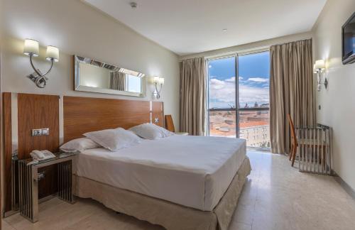 Habitación Doble con vistas a la ciudad del hotel Gran Corona Sol