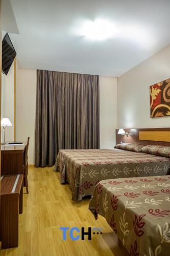 Habitación Triple Básica del hotel Tch. Foto 1