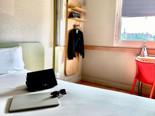 Habitación Triple del hotel Ibis Budget Madrid Alcorcon Mostoles. Foto 3