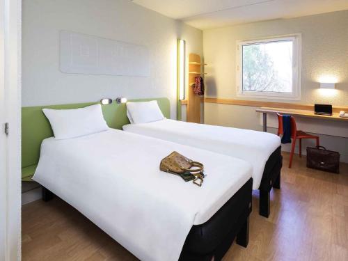 Habitación Doble - 2 camas del hotel Ibis Budget Madrid Alcorcon Mostoles. Foto 6