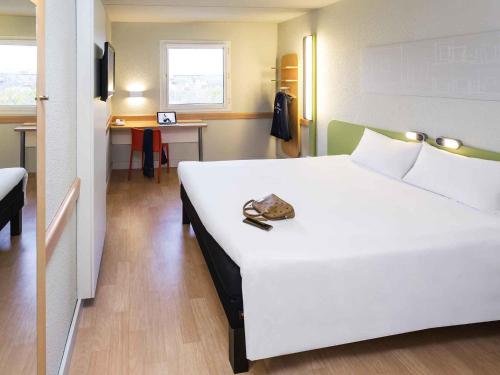 Habitación Doble - 2 camas del hotel Ibis Budget Madrid Alcorcon Mostoles. Foto 15
