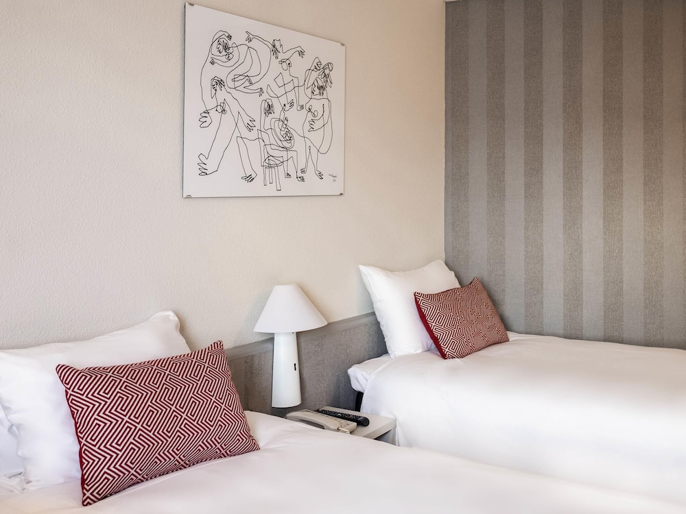 Habitación, 2 camas individuales del hotel Ibis Valencia Alfafar. Foto 3