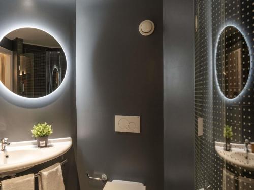 Habitación Doble con cama supletoria del hotel Ibis Madrid Aeropuerto Barajas