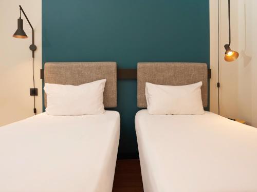 Habitación Doble Superior - 2 camas del hotel Ibis Madrid Aeropuerto Barajas. Foto 13