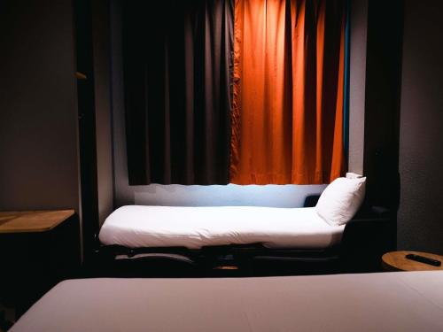 Habitación Doble con cama supletoria para niños del hotel Ibis Valladolid. Foto 4