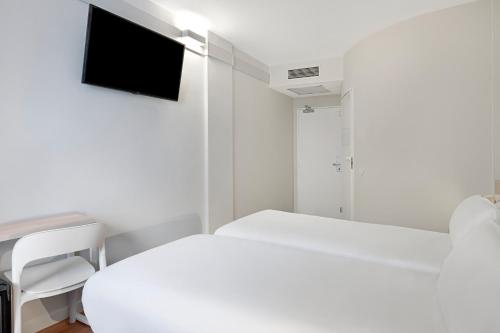 Habitación Doble - 2 camas dobles del hotel B&B Zaragoza Centro. Foto 1