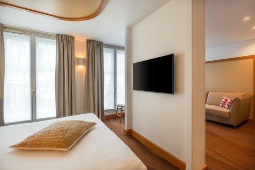 Suite Familiar del hotel Le Monna Lisa by Inwood Hotels. Foto 5