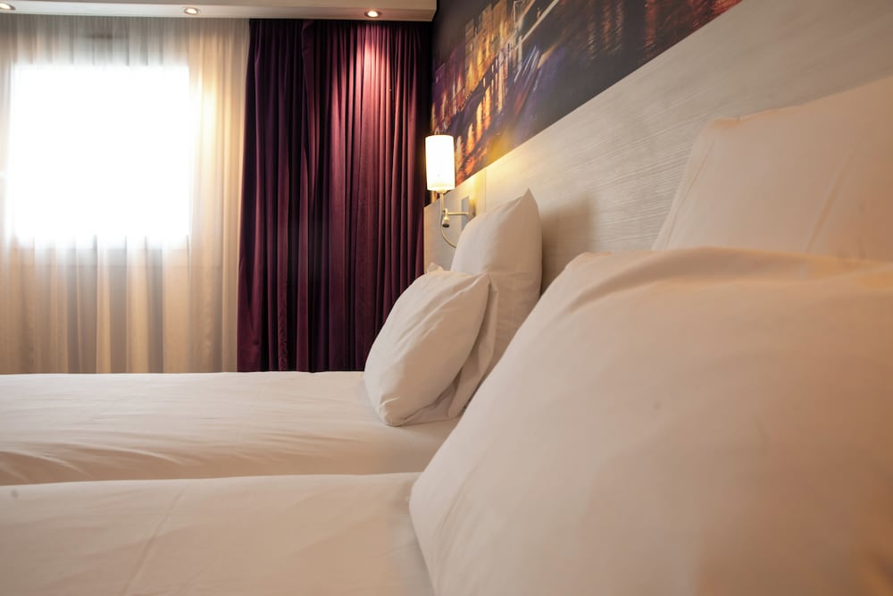 Habitación Clásica - 2 camas individuales del hotel Mercure Lyon Centre Charpennes Parc de la Tête d'Or. Foto 2